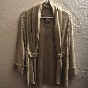 Tan sweater with button accents